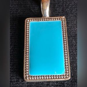 Silver tone turquoise color pendant